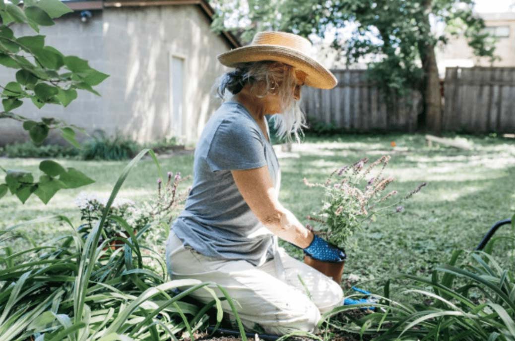 Senior woman in garden with IontoPatch on arm