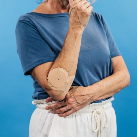 Senior woman with IontoPatch on her eblow